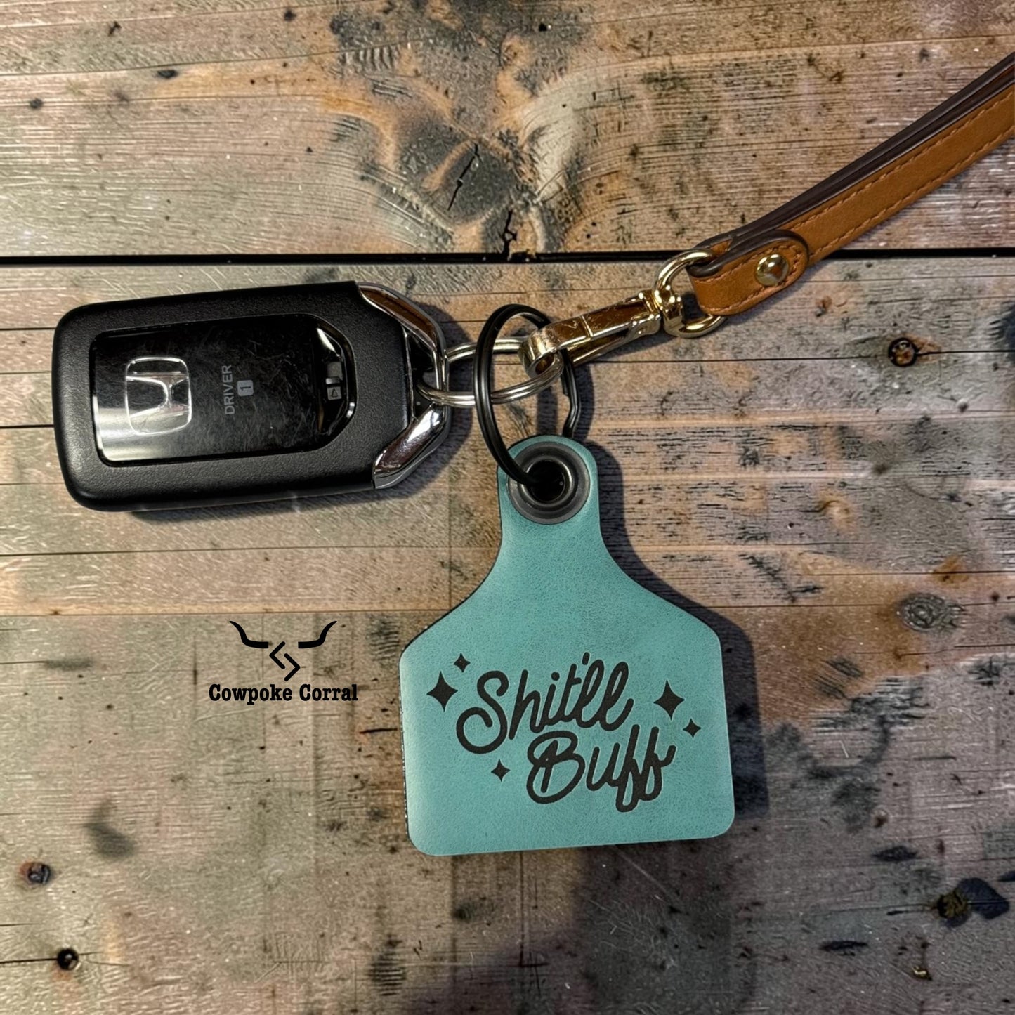 SHIT'LL BUFF CATTLE TAG KEYCHAIN
