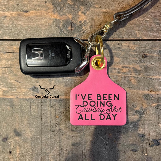 COWBOY SHIT CATTLE TAG KEYCHAIN