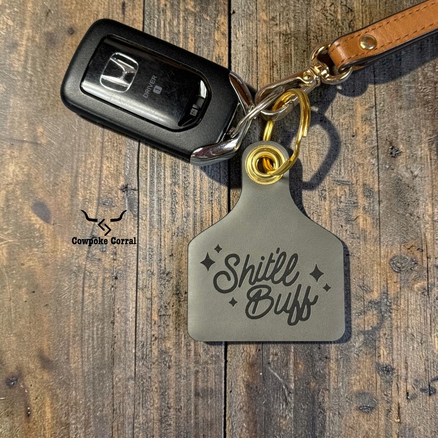 SHIT'LL BUFF CATTLE TAG KEYCHAIN