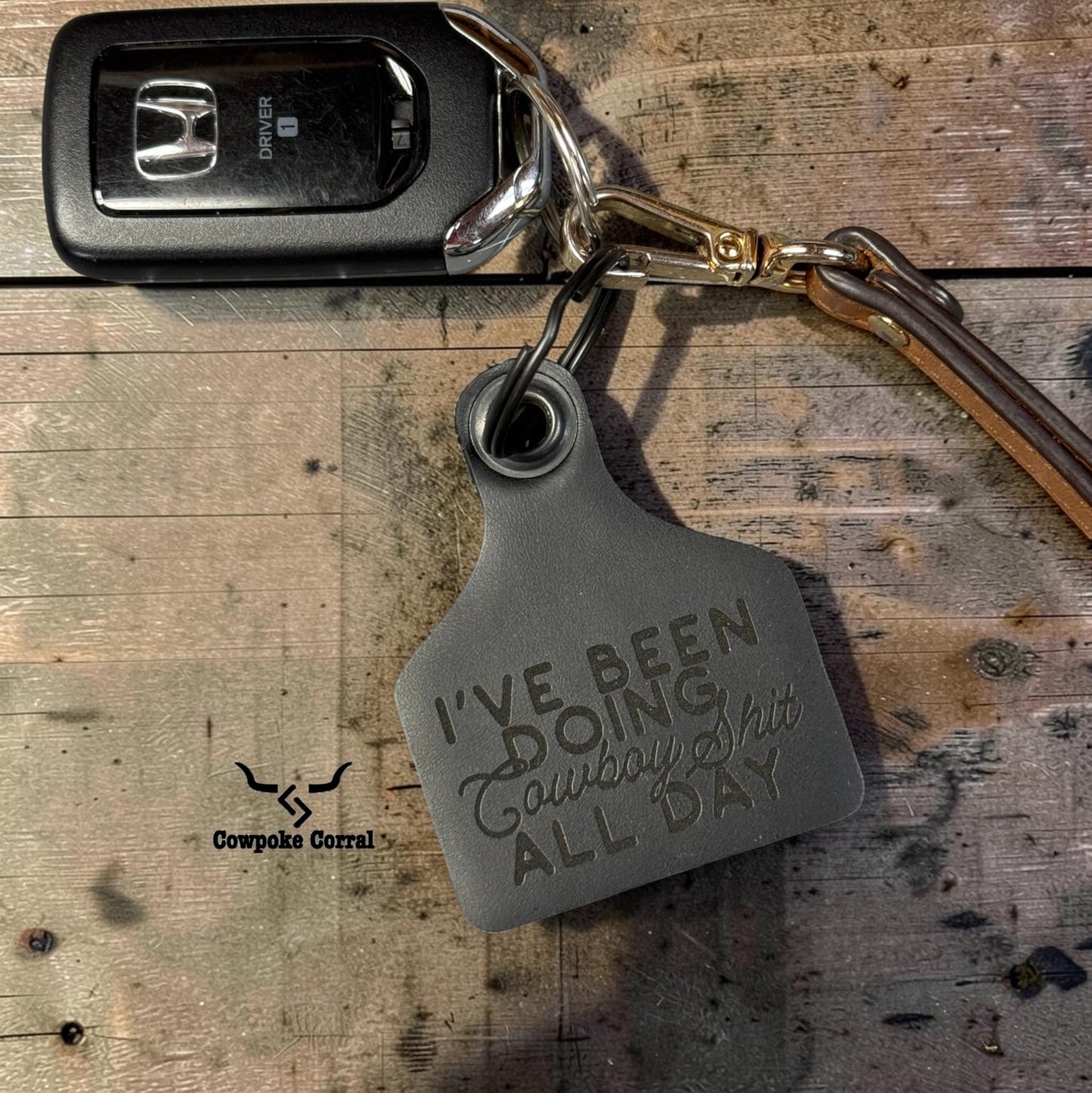 COWBOY SHIT CATTLE TAG KEYCHAIN