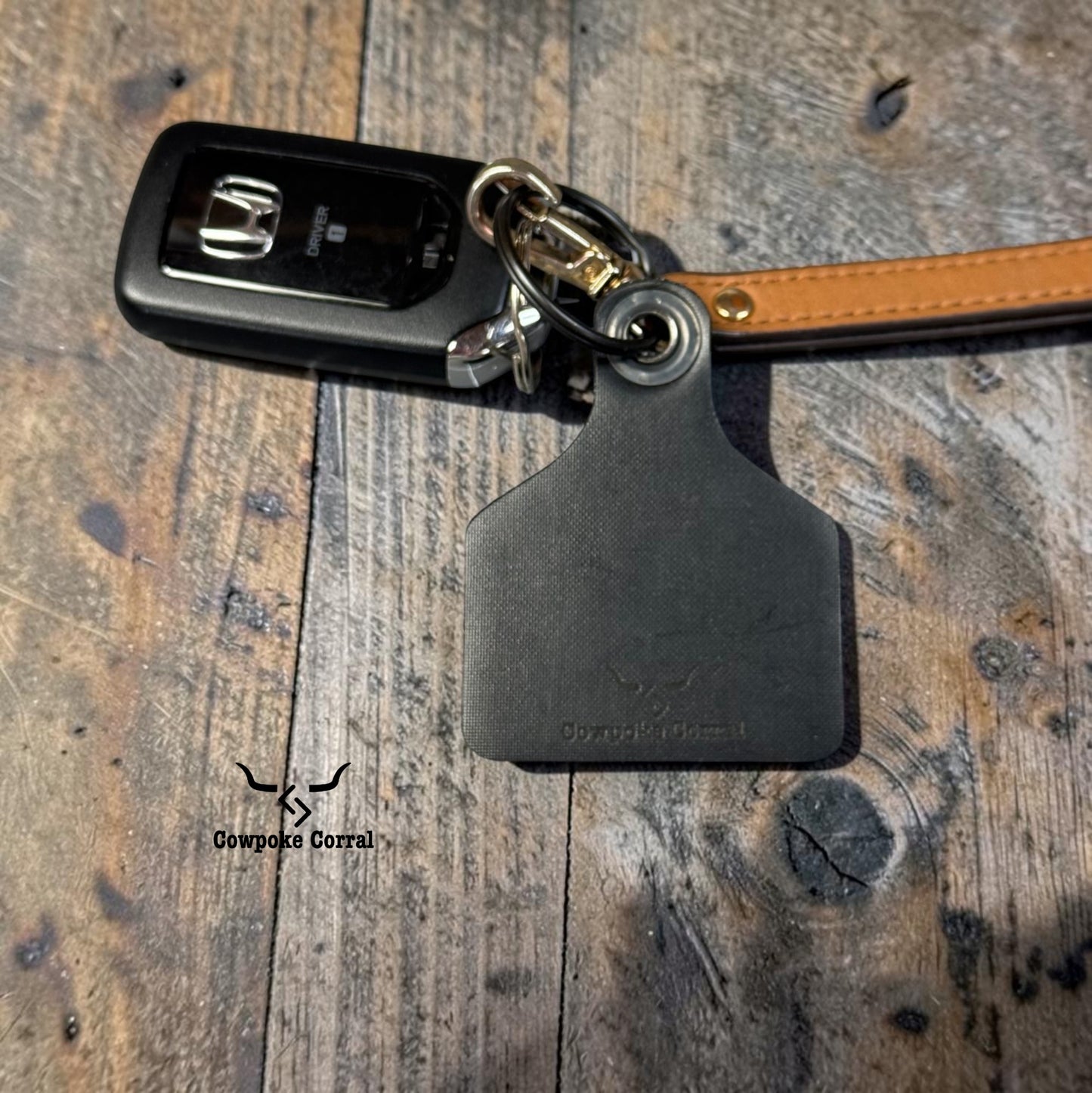 COWBOY SHIT CATTLE TAG KEYCHAIN