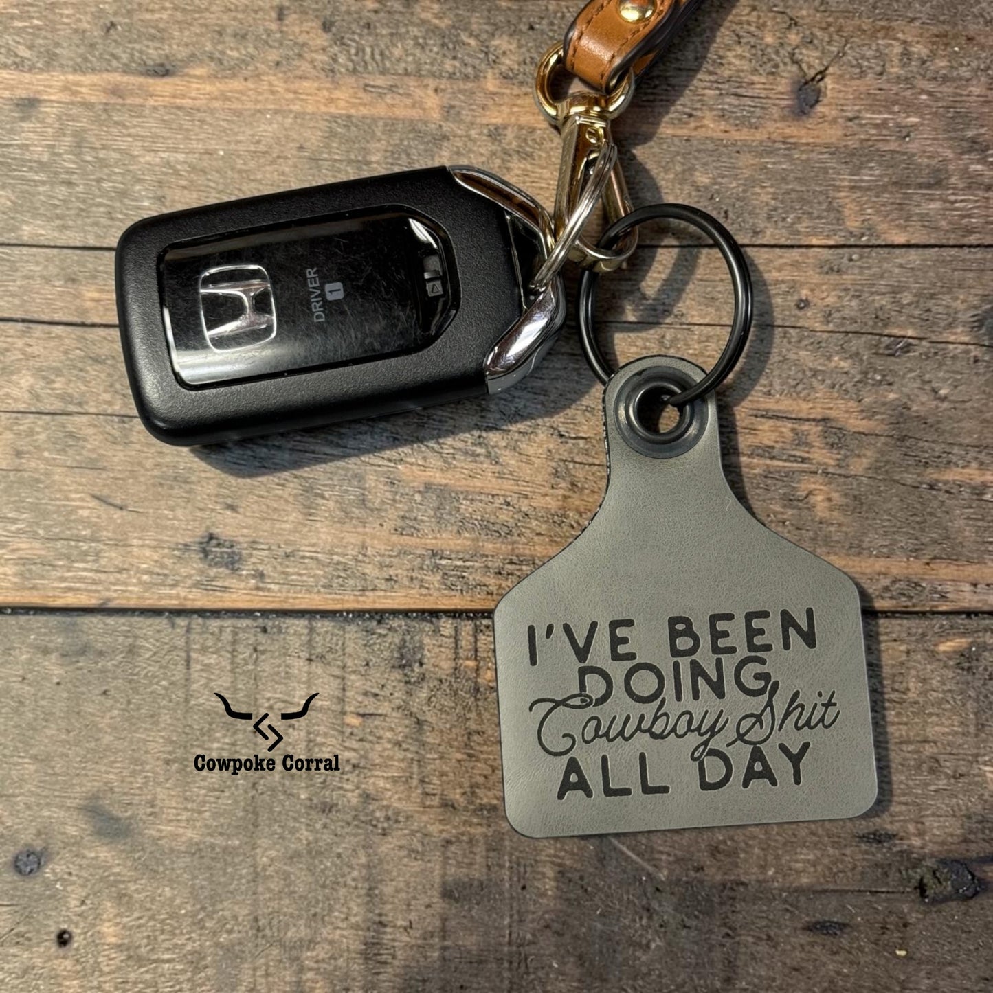 COWBOY SHIT CATTLE TAG KEYCHAIN